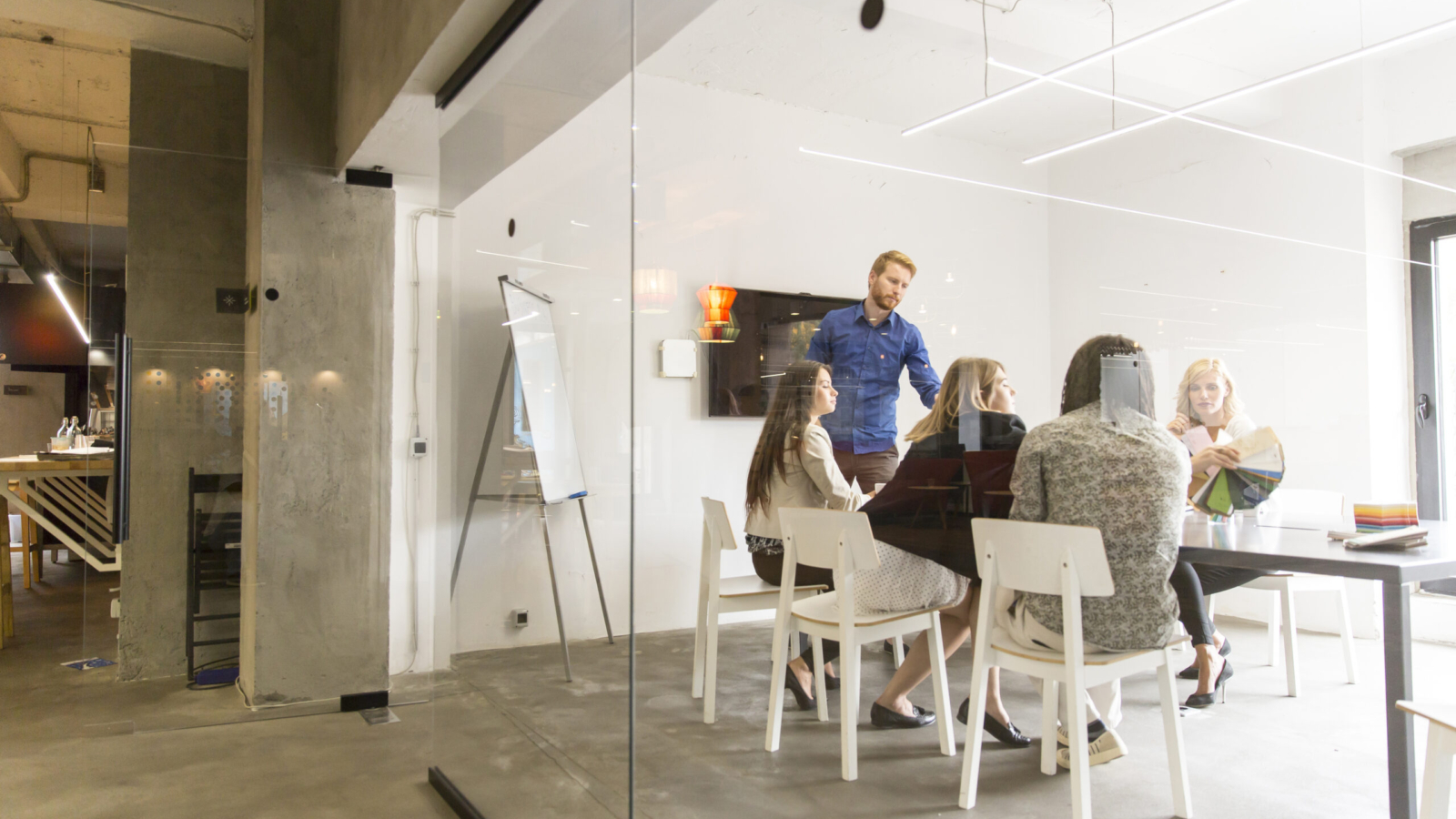 Multiethnic modern business team developing the company's strategy at the office